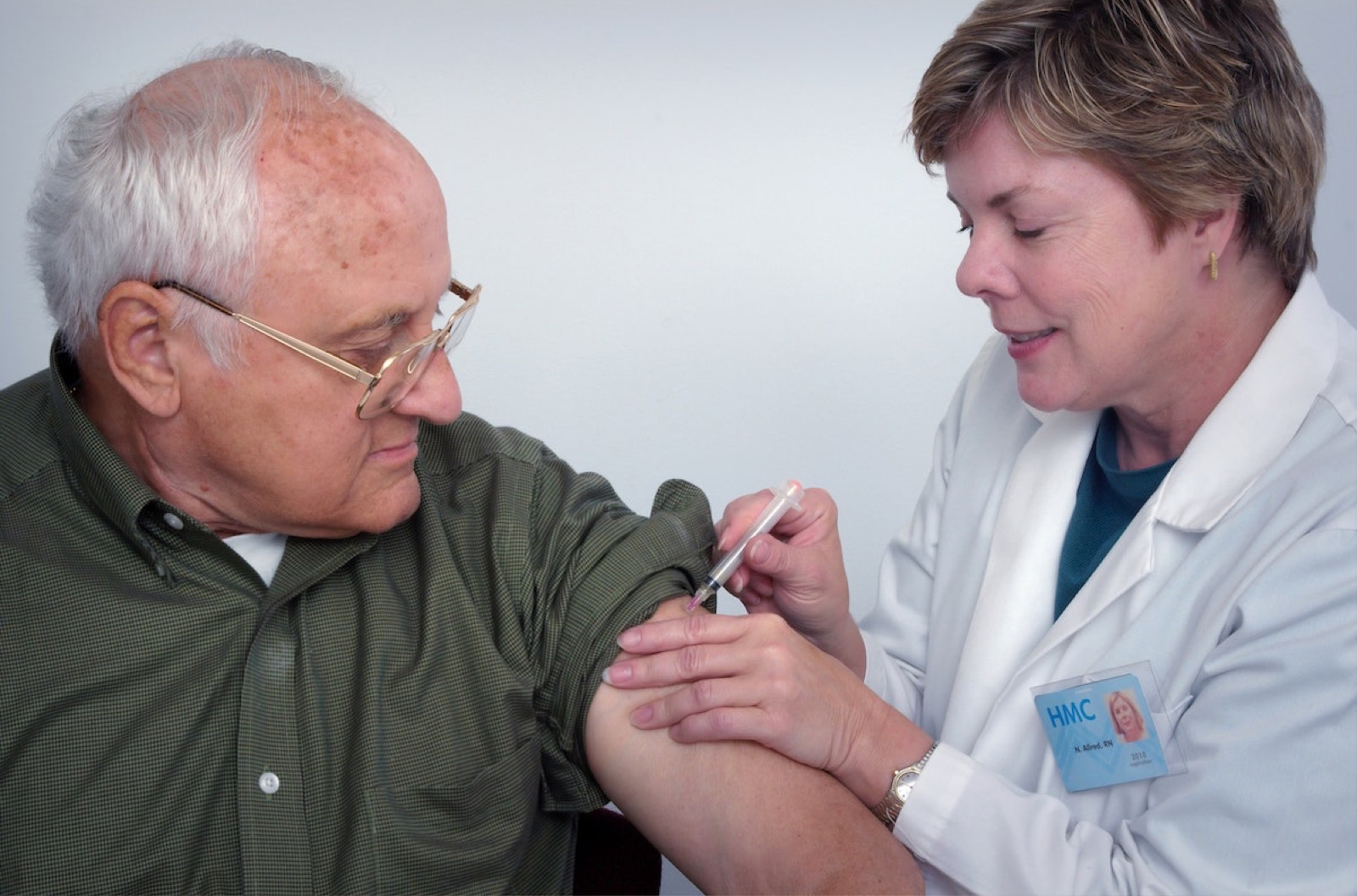 A clinician providing care to an older adult
